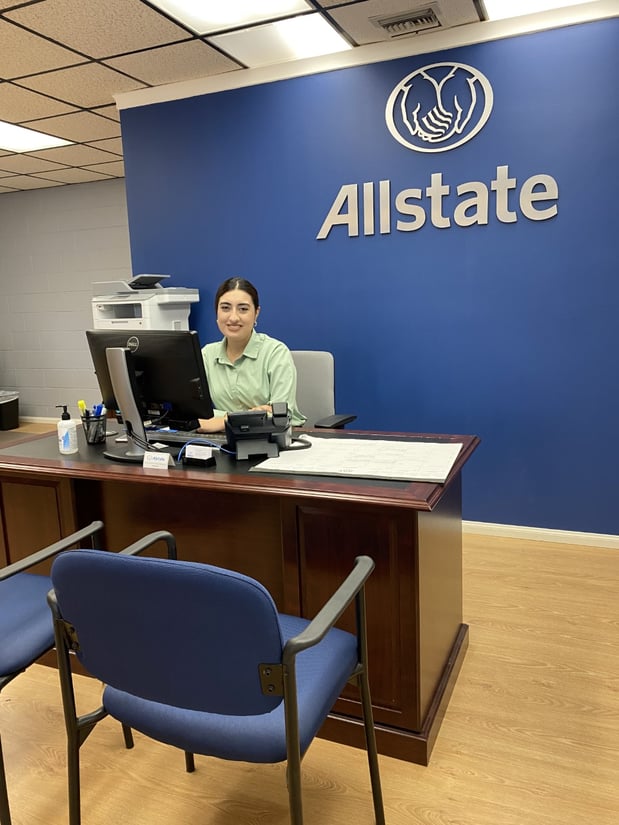Once you walk in the office, you will be greeted by a customer service representative Grabriela Espinola Mora.