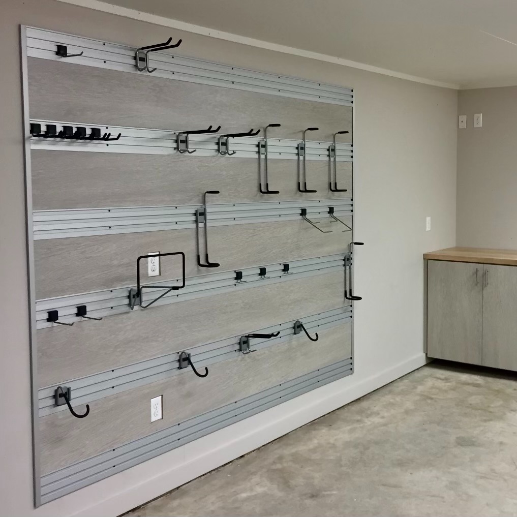 Garage Wall Organizer Custom storage in garage fusion track wall system garage organization California Closets New Orleans & Gulf Coast