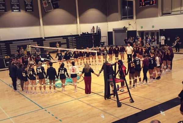 high school volleyball team after a game