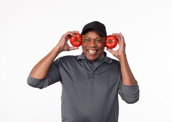 Man holding tomatoes