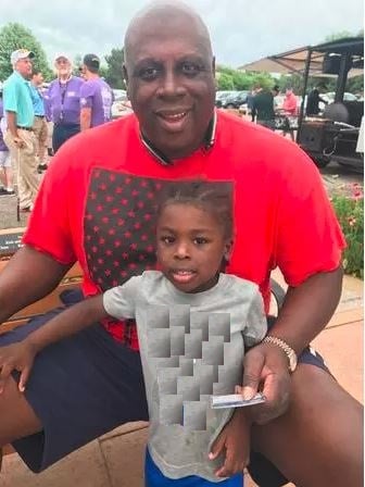 X-man and his son Max at Legacy customer appreciation event