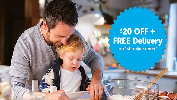 Father and child cooking together.