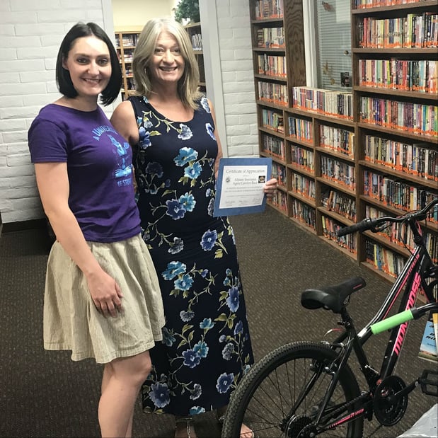 It was my pleasure to present this bicycle to Stephanie Birr, youth services librarian for the Los Lunas Public Library, as a prize for the library’s summer reading program.