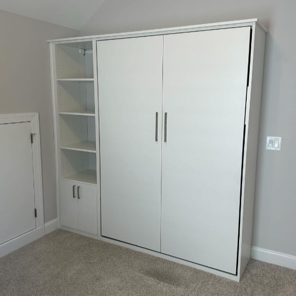 Guest Room Guest room options with a reclined wall-bed, shelving and cabinets.