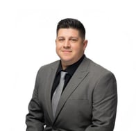 A headshot of Goosehead agent Marcos Delgado