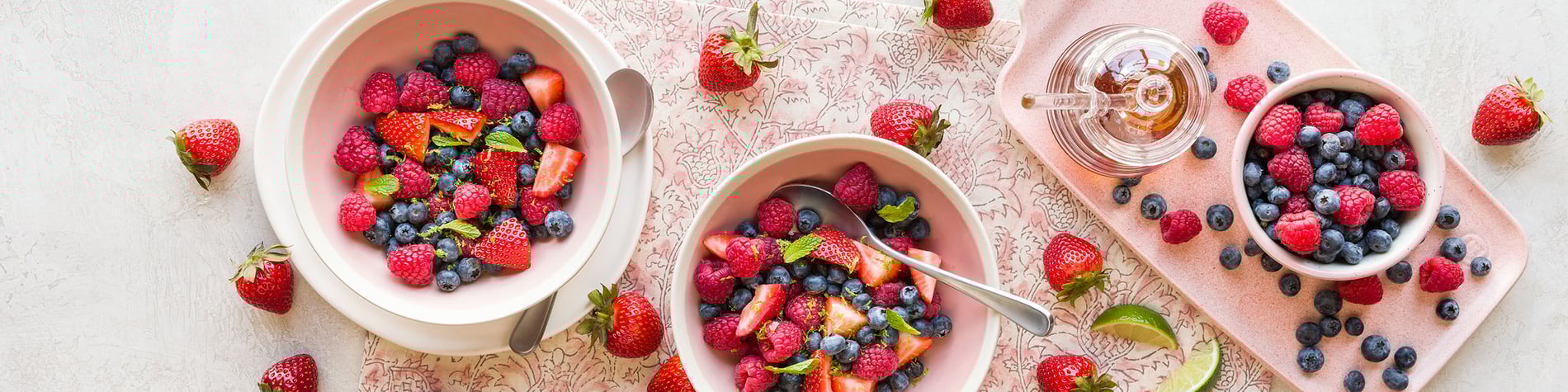 bowls of berries on a table