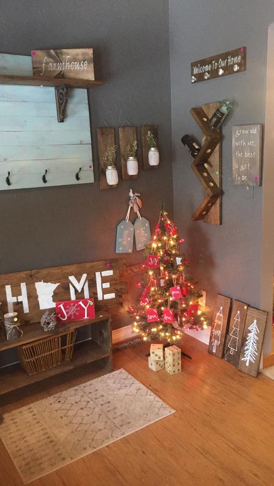 Small christmas tree in the corner of a room