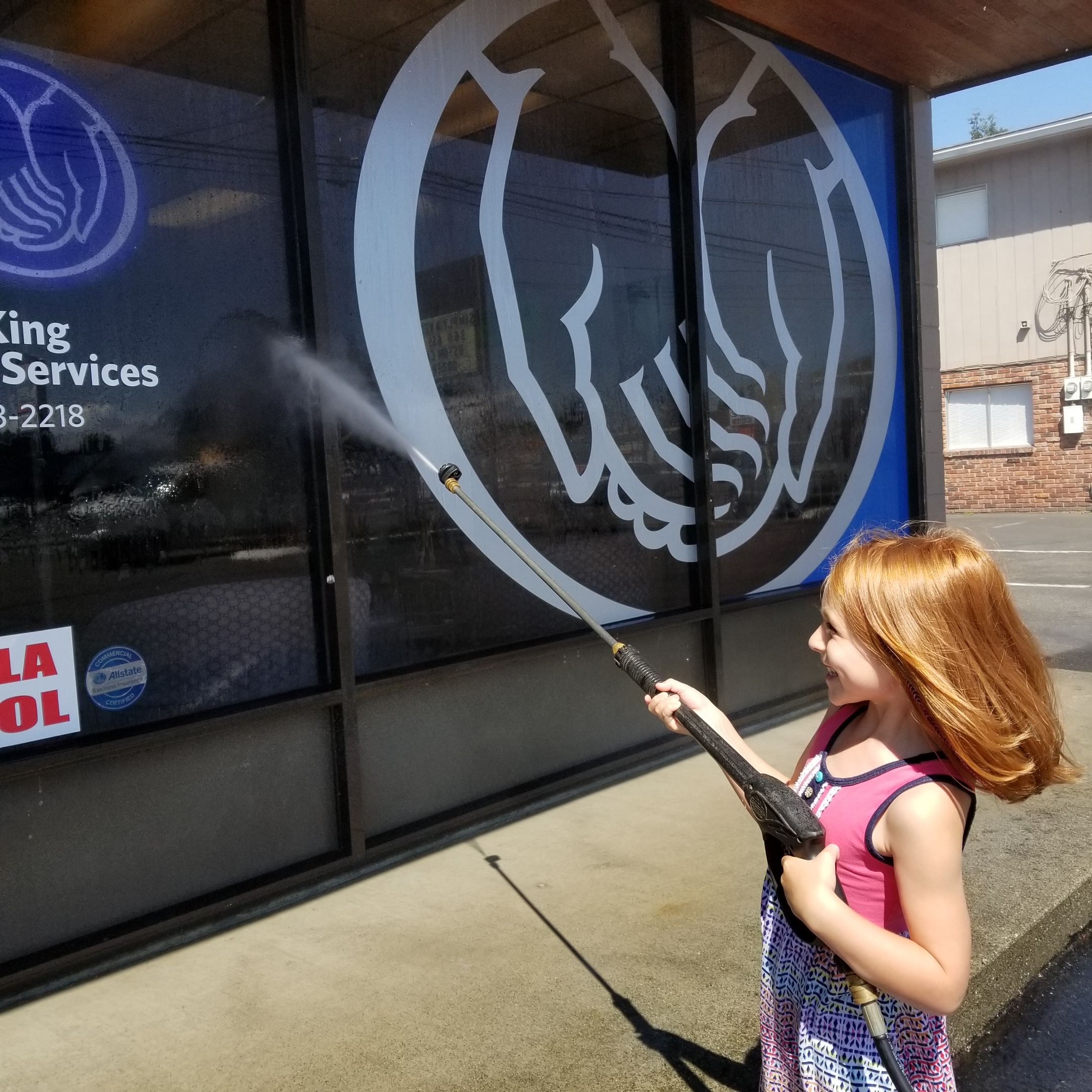 My little girl, Piper, making sure we keep the office windows clean :)