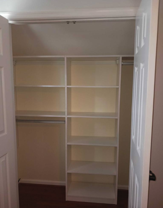 Wide closet design by California Closets Virginia Beach, Virginia.