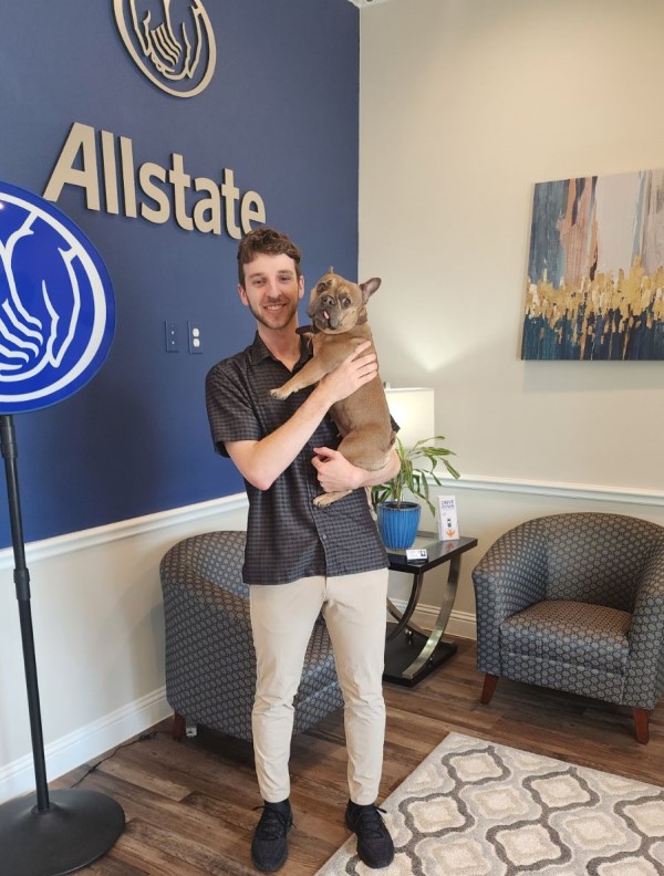 Our Licensed Sales Professional Jake with Milo, his adorable dog, on “Bring Your Pet to Work Day”!