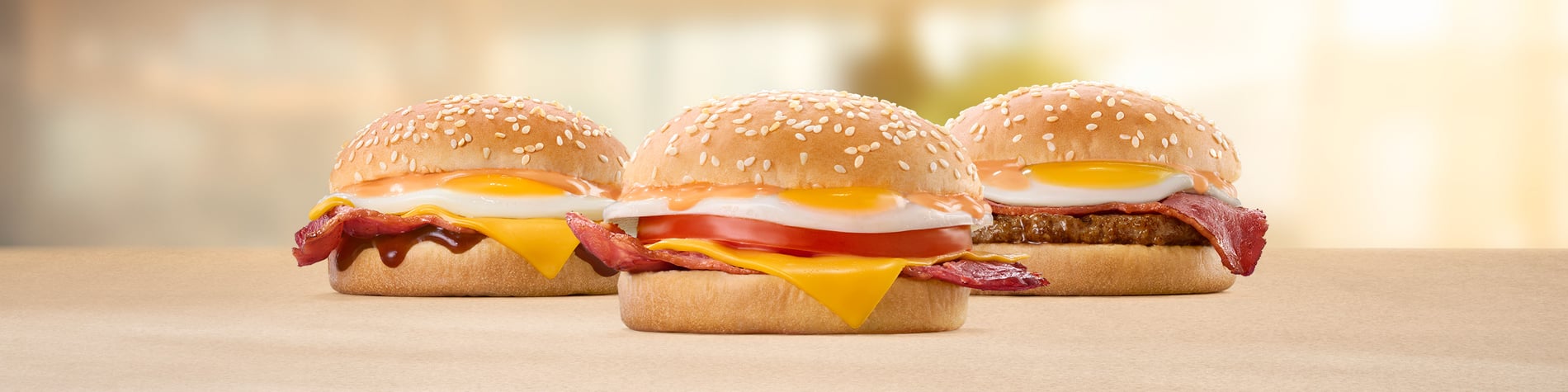 Breakfast buns with macon egg cheese and beef patty