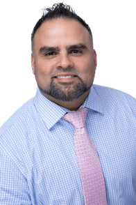 A headshot of Goosehead agent Chris Garcia