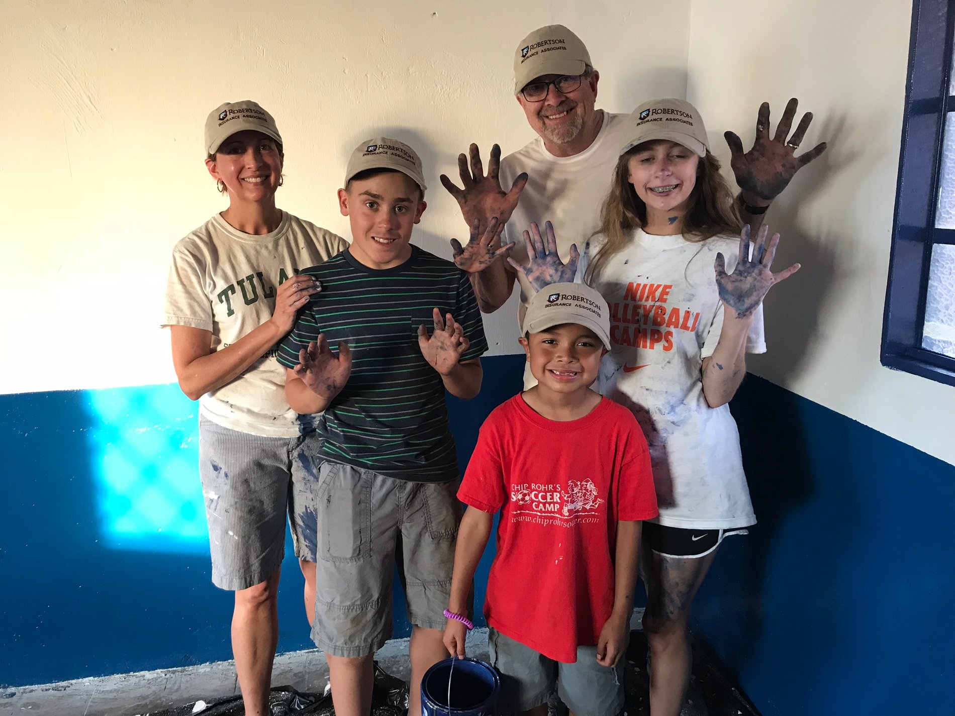 My family painting at Evangelica Unidas (school house) of Taunay, Brazil on a mission trip in 2018.
