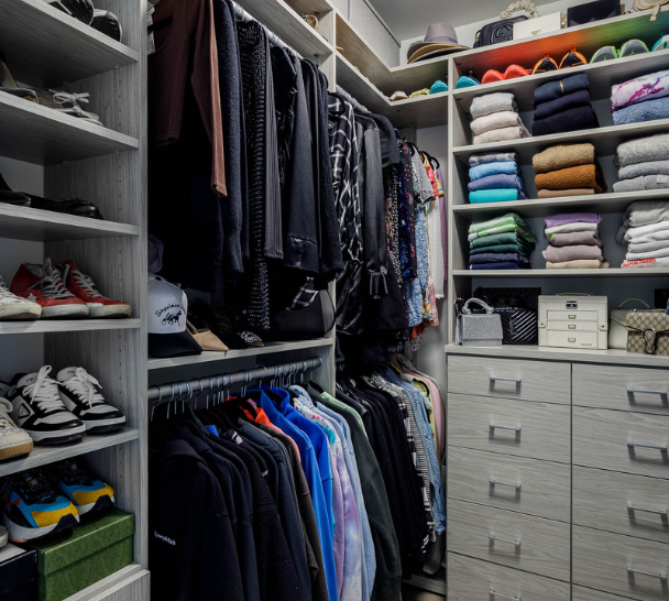 Modern Gray Walk-in Closet gray modern walk-in closet her side with double hanging, shoe wall, shelving for sweaters and drawers Brooklyn New York City