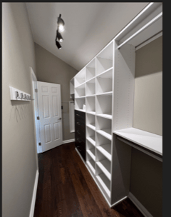 Walk-in closet Beautiful walk-in closet with black and white finishes.