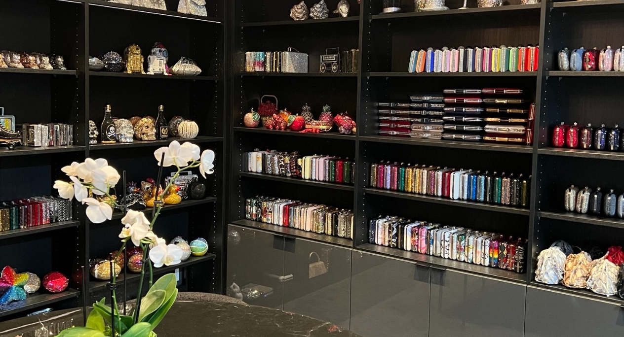 Black and Lacquered Gray Display Wall California Closets Brooklyn NY MTA closet drawer organizer small walk in closet ideas luxury closet custom cabinets purse collection displayed shelving and drawer organization