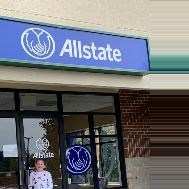 Outside photo of our daughter Aiden coming to the office to help us out