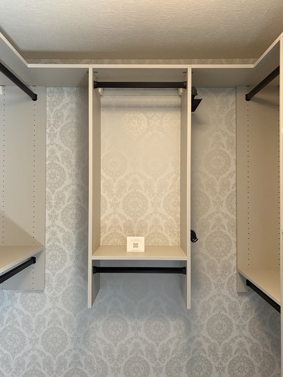 Custom Closet Custom hanging space in a walk in closet.