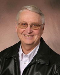 Arthur E. Crago, MD