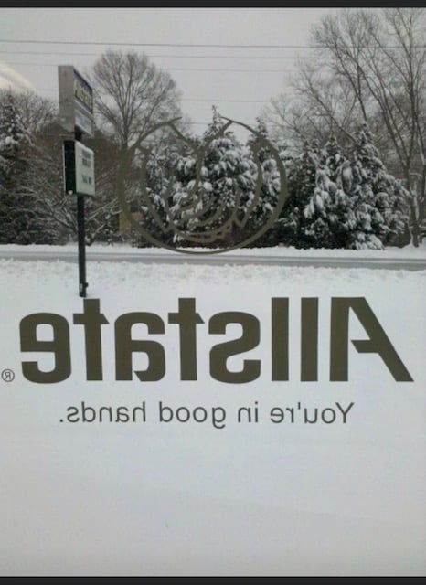 Looking through the front door at the snow