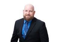 A headshot of Goosehead agent Justin Vititoe
