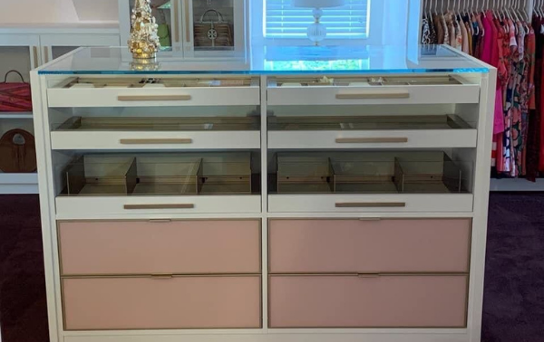 Custom Closet Furniture Custom closet furniture with drawers to store accessories or additional clothing.