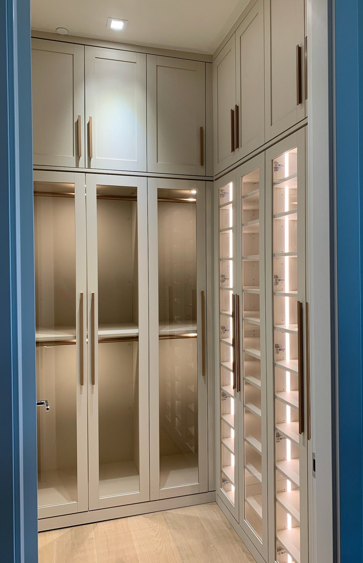 Walk- In Closet Luxe Walk In Closet with Glass, lighting ample hanging and shoe storage