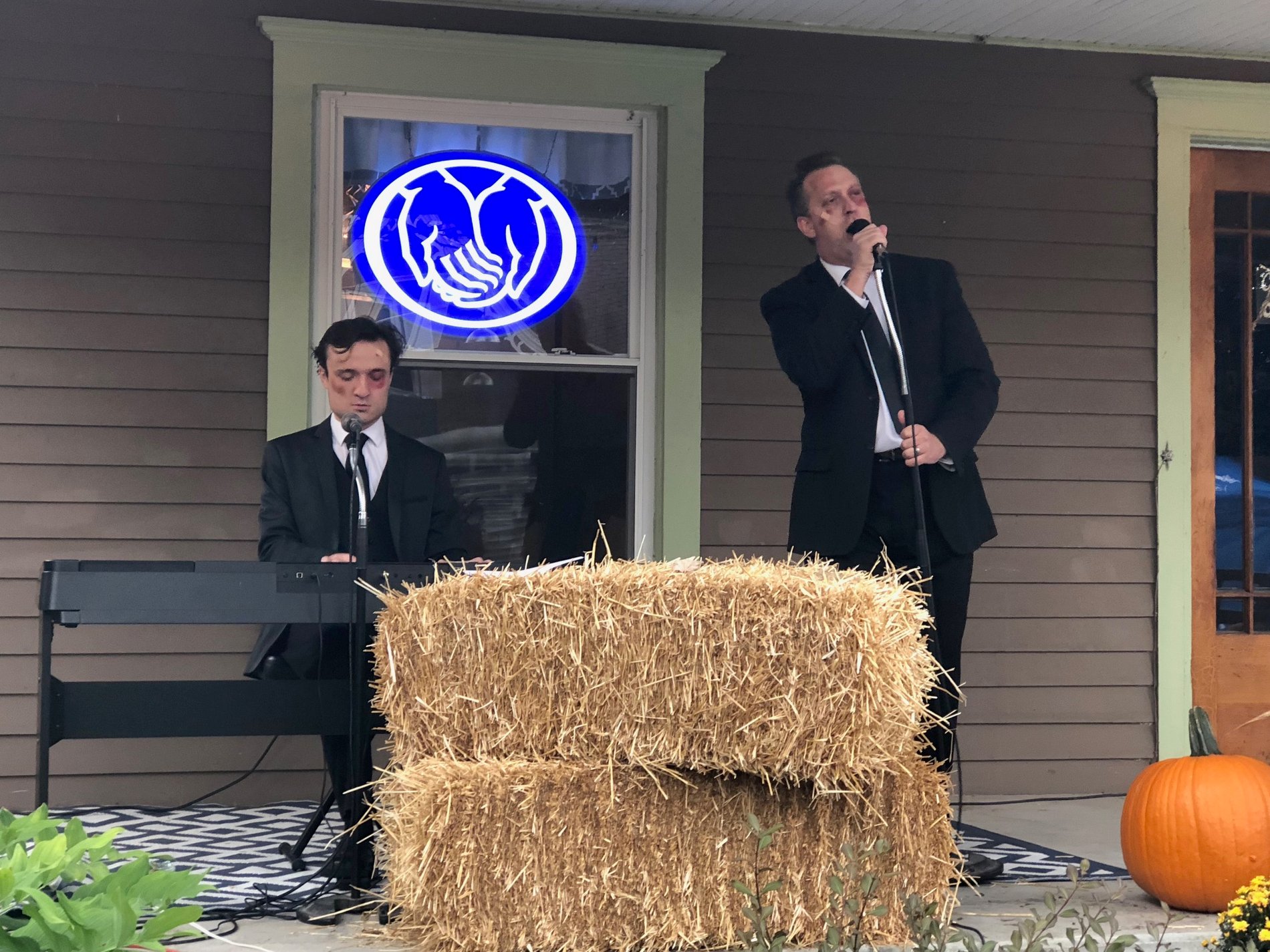 Agency staff John Kreuzer and his son Jeremy create a little "Mayhem" while entertaining the crowds at Fall Fest 2018.