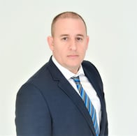 A headshot of Goosehead agent Yoandy Trimino