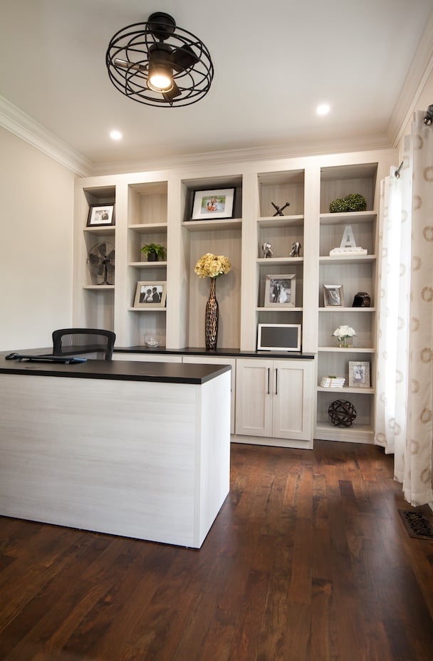 A Workspace with Purpose Home office with custom built-in cabinetry, desk storage and open shelving designed for an organized workspace. California Closets, Greater Detroit