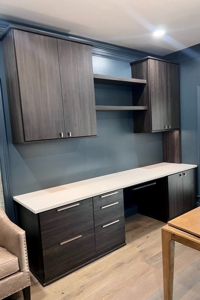 Dark Gray Office Dark office space with desk and custom cabinets for storage California Closets Gulf Coast & New Orleans
