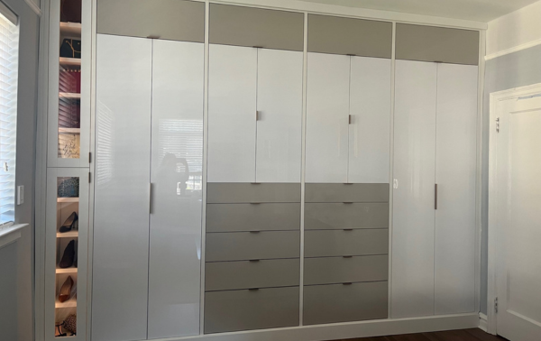 White and Gray Lacquered Wardrobe California Closets Rockland County New York closet cabinetry white and gray walk in closet design ideas closet cabinetry closet organization drawers storage ideas for closets