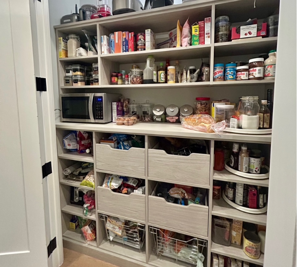 Functional Gray Pantry Img 7 - California Closets Nassau County Designer Pantry White pantry with dedicated pull out bins for storage and adjustable shelving for spices and cooking supplies