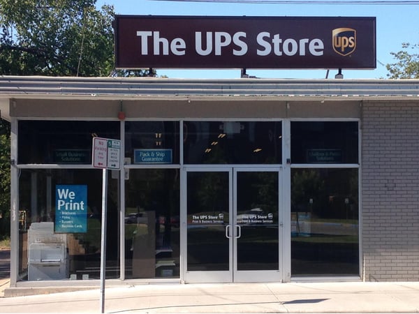 Facade of The UPS Store Lacy Lakeview next to Starbucks and Cracker Barrel