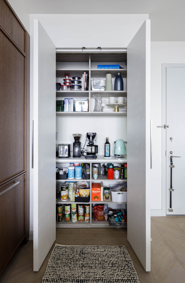 Custom Built Pantry gray pantry with open shelving to hold dry goods, coffee machines, and all pantry items behind closed doors Brooklyn New York. NY