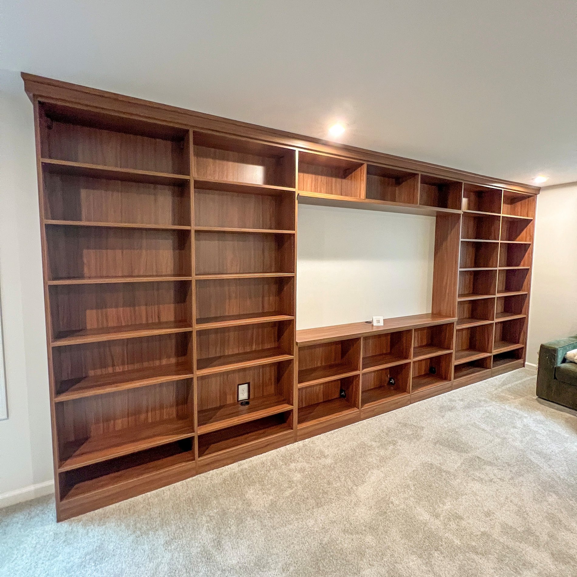 Siena Media Center A bookworm's dream! This media center bookshelf is in Siena finish dark brown wood with Siena backing.