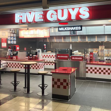 A photo of the Five Guys restaurant located at Concourse D inside Ronald Reagan National Airport in Arlington, Virginia.