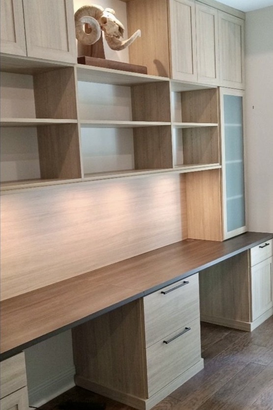 Cozy Office Space Brown office space with a double desk custom bookcase and bookshelves California Closets New Orleans & Gulf Coast