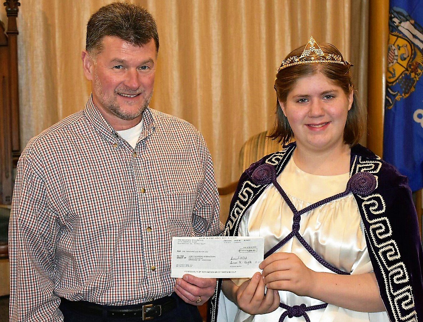 Tim recently presented this check donation to Zoey Andersen of the local Green Bay Bethel of Job’s Daughters.