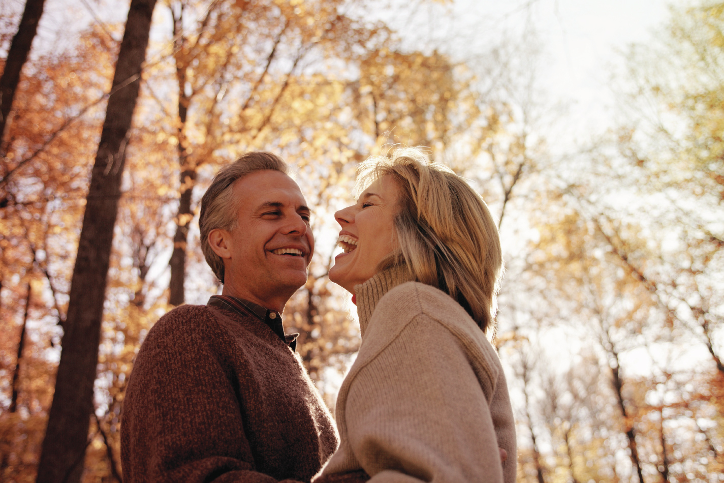A couple enjoying a fall day outside.