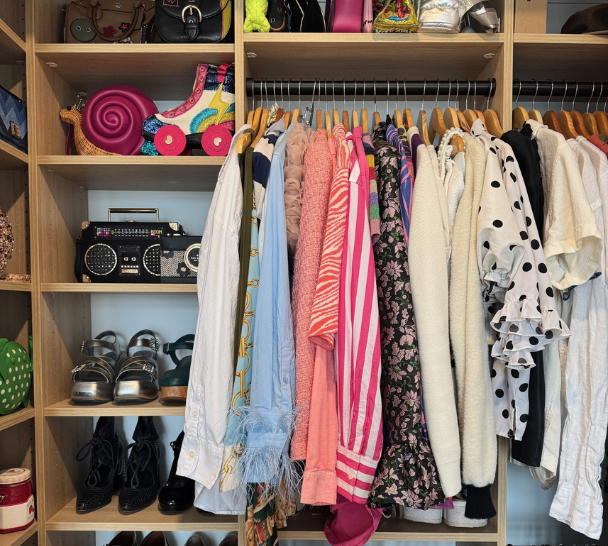 Natural Wood Closet Organization California Closets New York wood custom reach in closet with custom adjustable shelving for folding shoe organization or accessories overhead shelving double hanging rods for hanging clothes