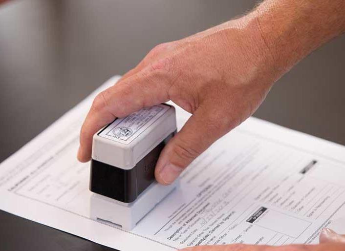 Document being notarized at The UPS Store