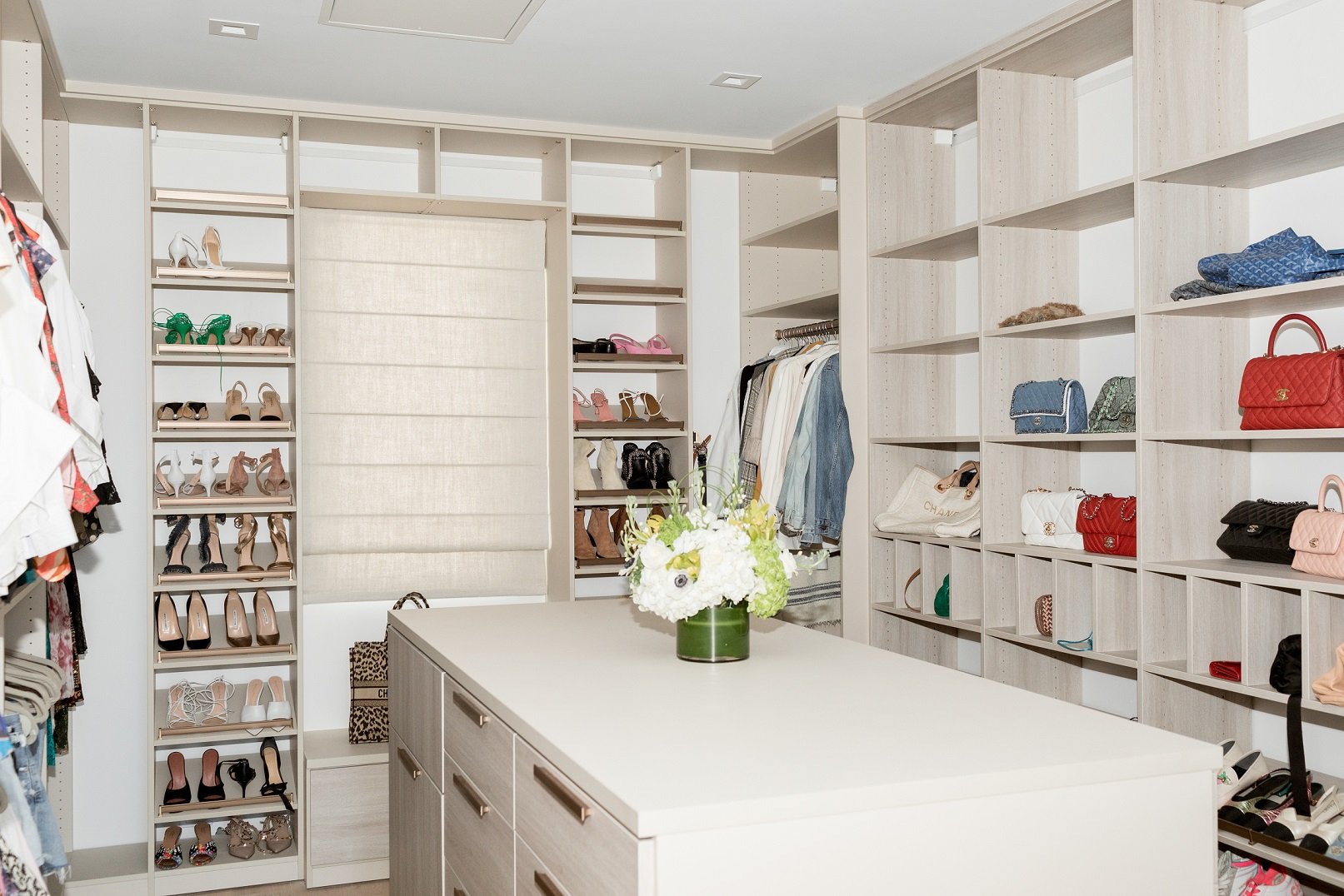 Beautiful walk-in closet with center island Beautiful walk-in closet with center island by California Closets Miami, Florida.