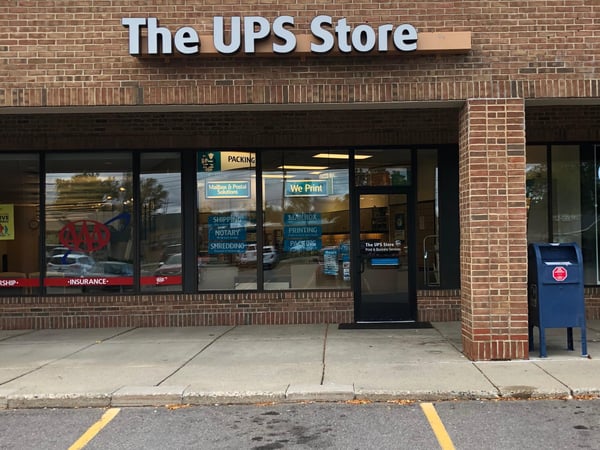 front of the ups store at 2843 E Grand River