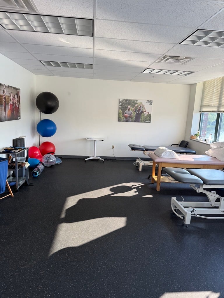 ME-Topsham-MVPT patient care area showing PT Tables and equipment.