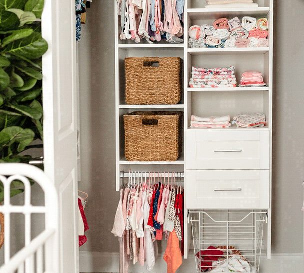 Reach-in nursery closet Nursery reach in closet with bins and wire baskets