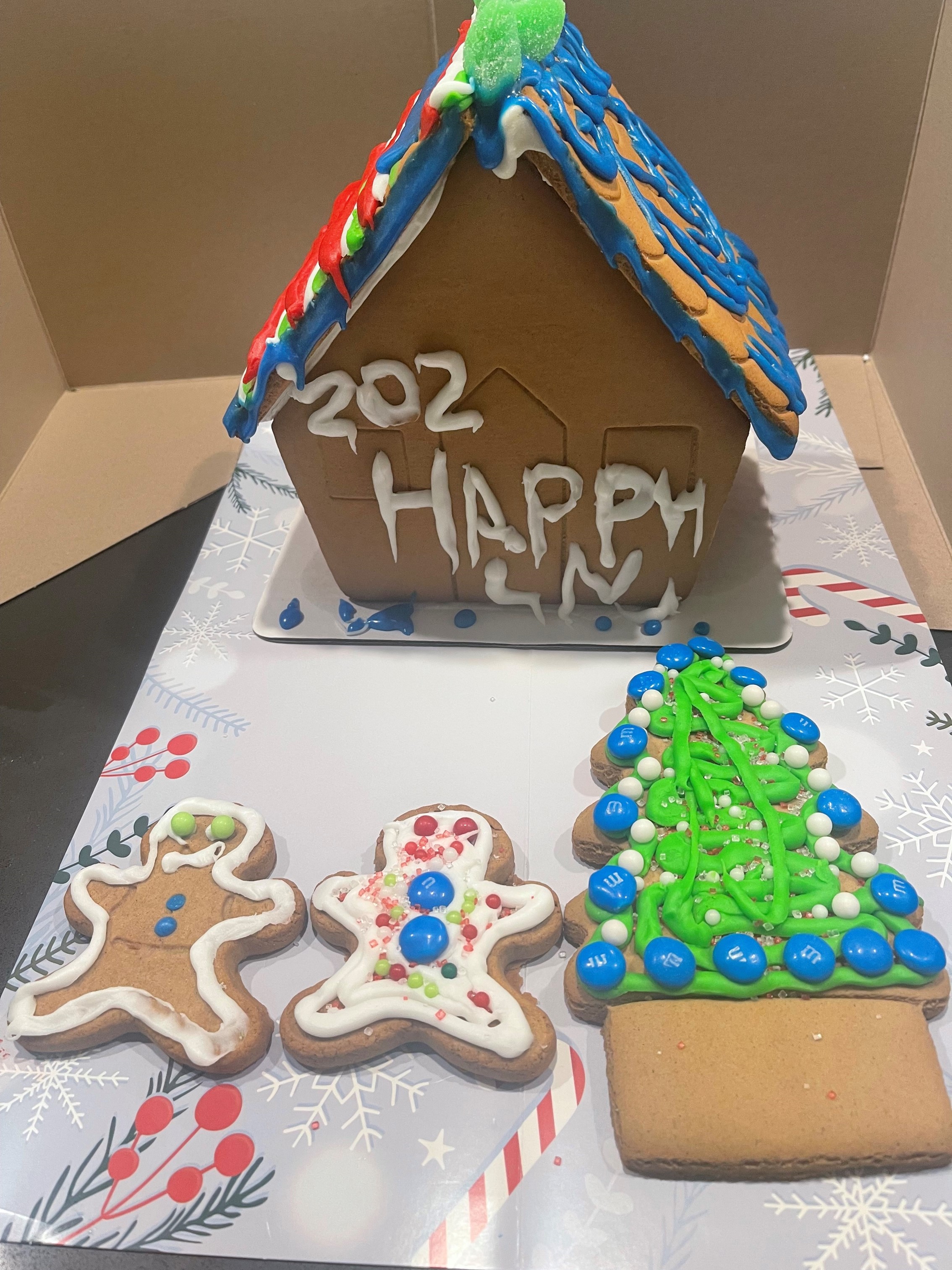 It’s not only a time for giving, but a time for fun, delicious crafts! Our staff member, Emily, entered a gingerbread house making contest!