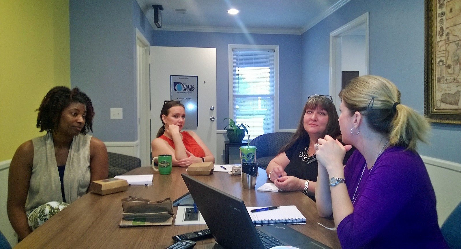 Crystal leading an early morning team meeting… Topic of discussion: wonderful customers!