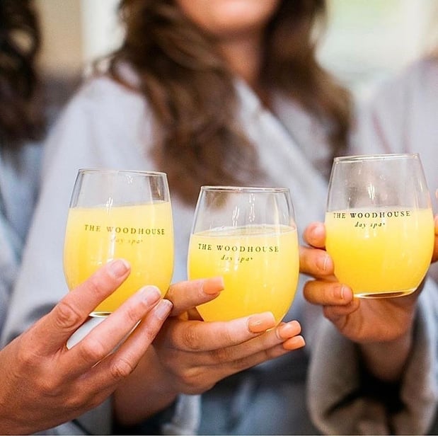women-in-robes-with-mimosas-spa-day