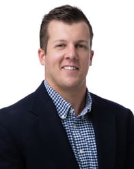 A headshot of Goosehead agent Frank Warren
